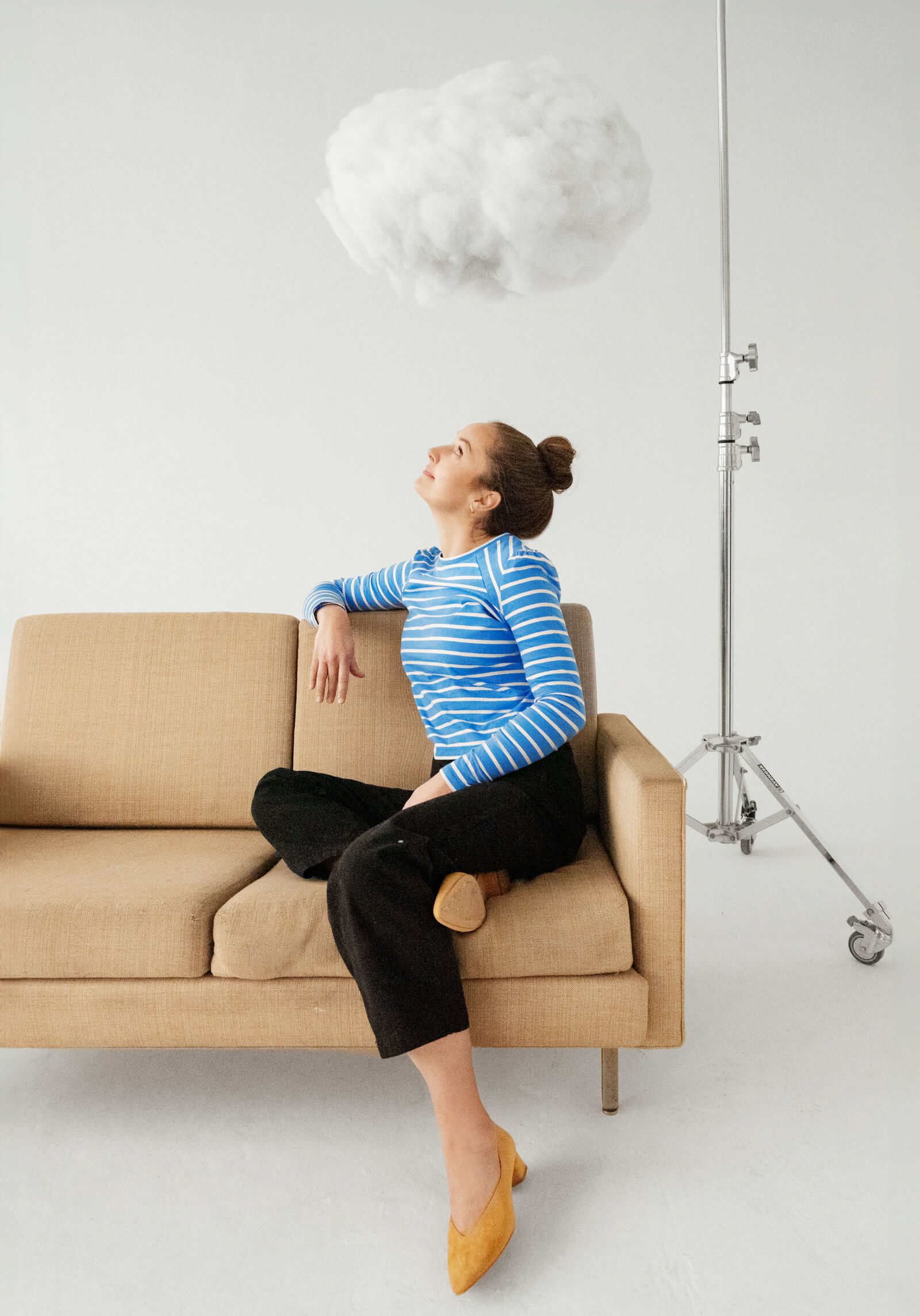 Cecelia Mandryk looking up at a cloud